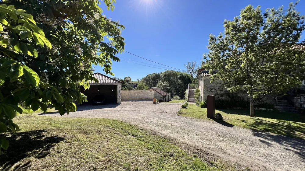 Tree-lined entrance drive of Louroca